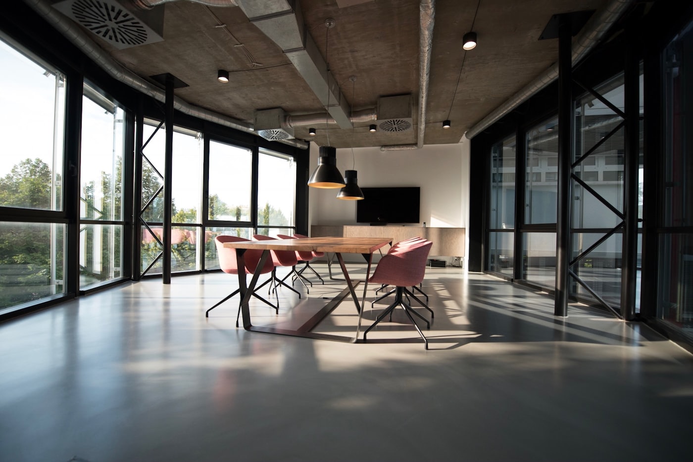 A warm, light-filled reception space at the Living office in Kakkanad